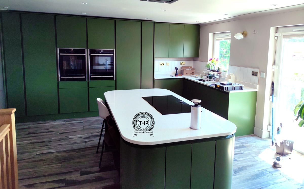 image of white hand painted cabeints and copper handle