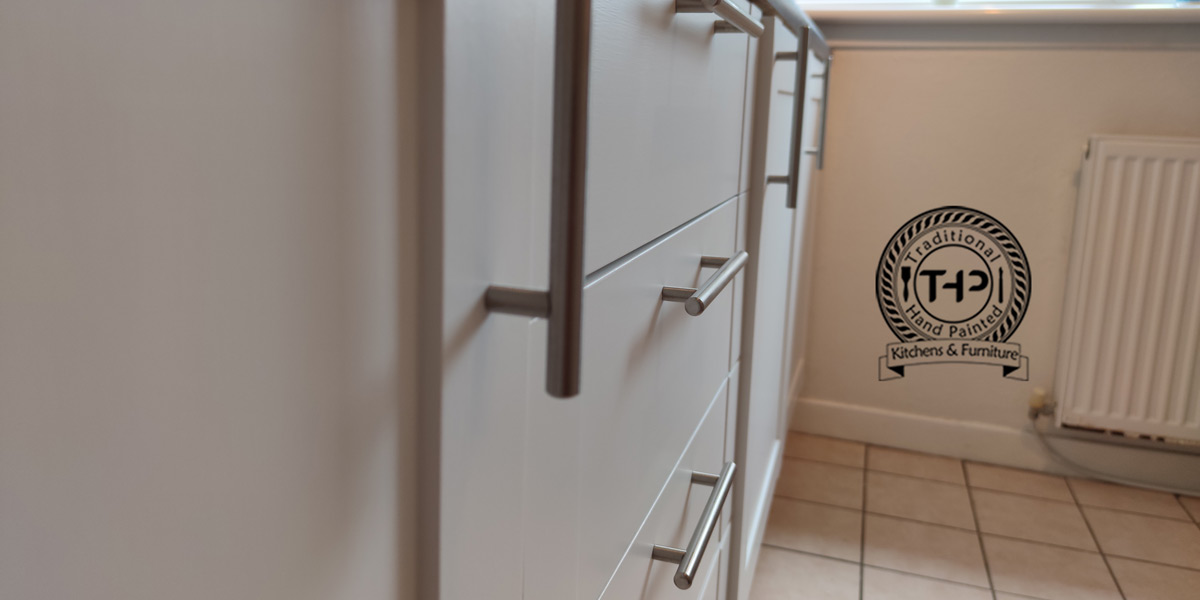 close up image of old cabinet handles